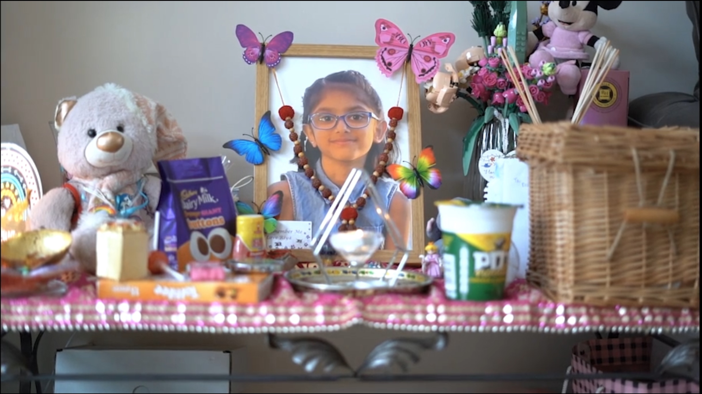Framed photo of Riya surrounded by her favourite things